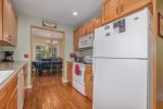 Looking from the kitchen into the dining room
